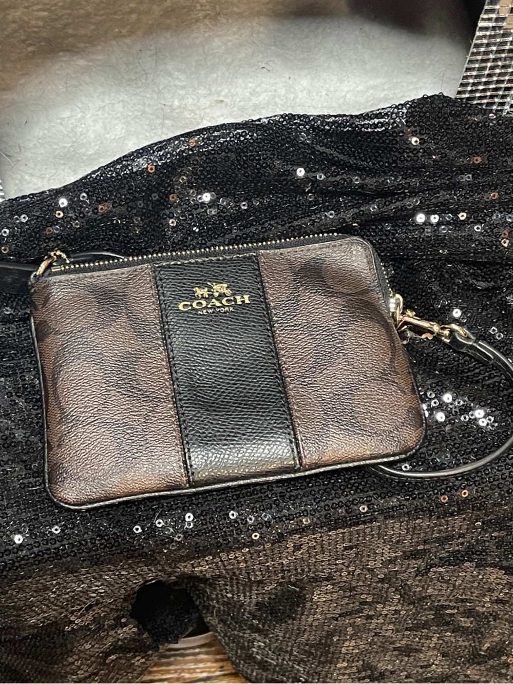 Coach Leather Wristlet in Brown and Black with Gold Logo